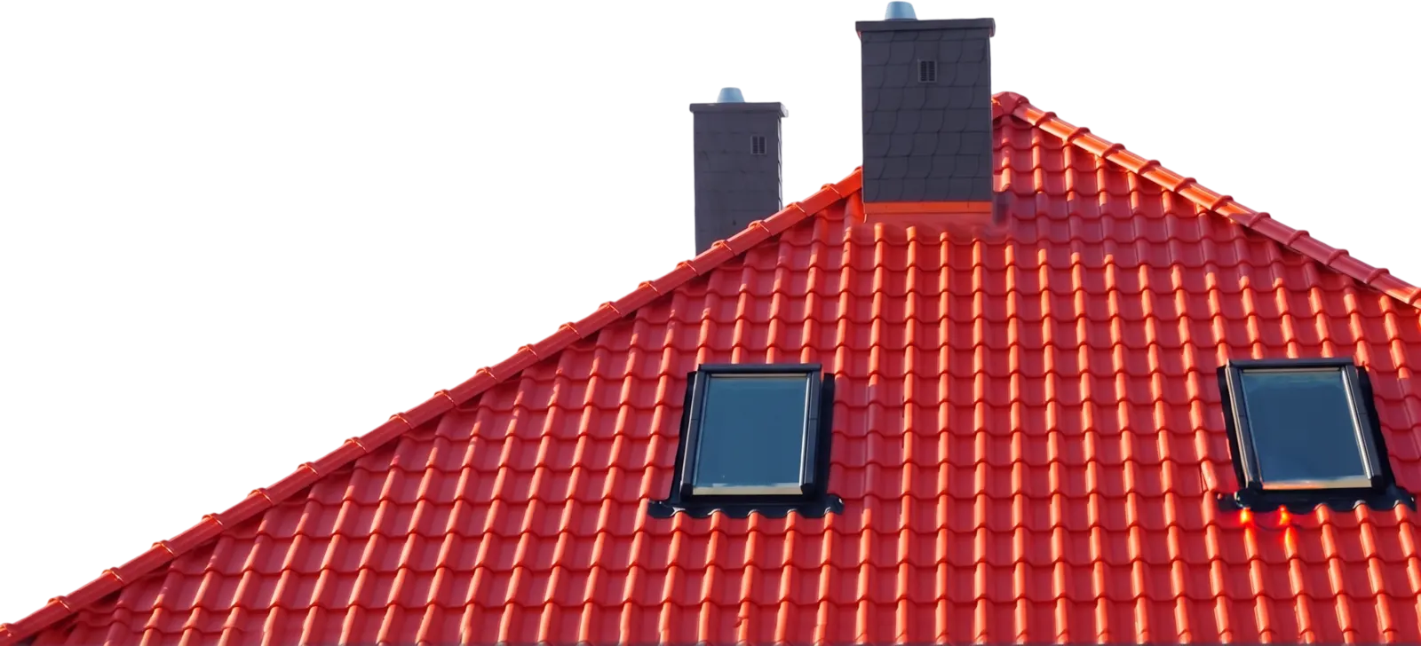 Freshly fitted red tile roof with two chimneys and skylights